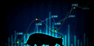 Bull market concept with stock chart and the indicator show an uptrend / stock market bull finance safe trend investment business and positive market