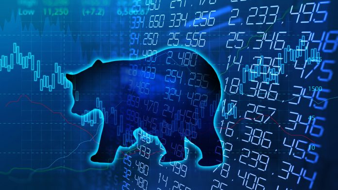 silhouette form of bear on financial stock market graph represent stock market crash or down trend investment